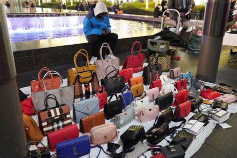 is it illegal to buy a fake bag in us|selling counterfeit designer bags.